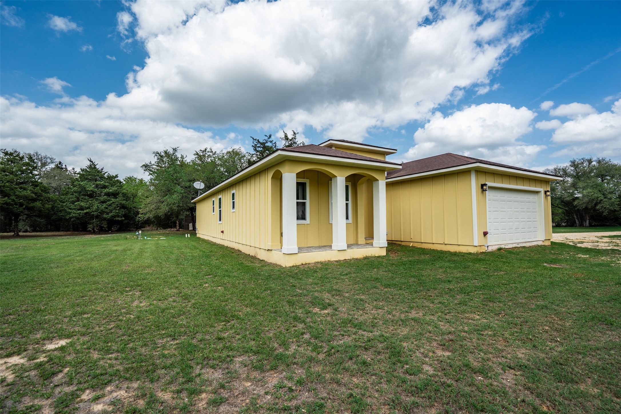 1354 Old Pin Oak Road Paige, TX 78659 - Photo 27 of 37 a view of a house with a backyard