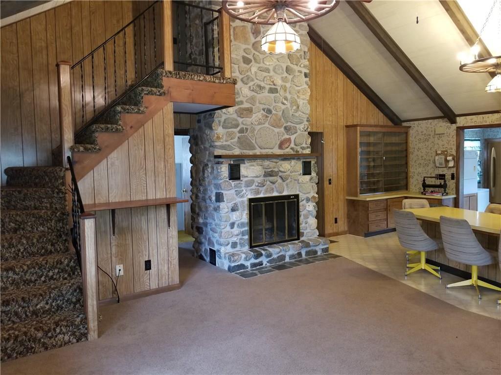 609 Long Pond Road Jackman, ME 04945 - Photo 3 of 19 Custom stone fireplace with...