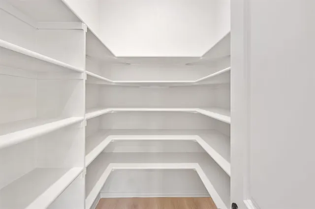 a view of a room with shelves