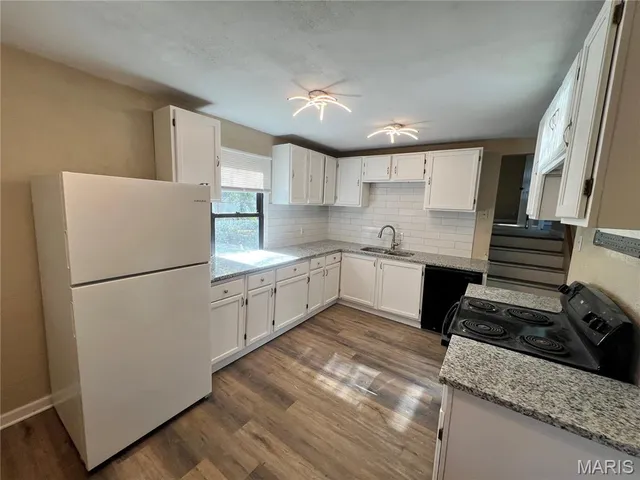 $184,900 | 2390 Teakwood Manor Drive, Florissant, MO 63031