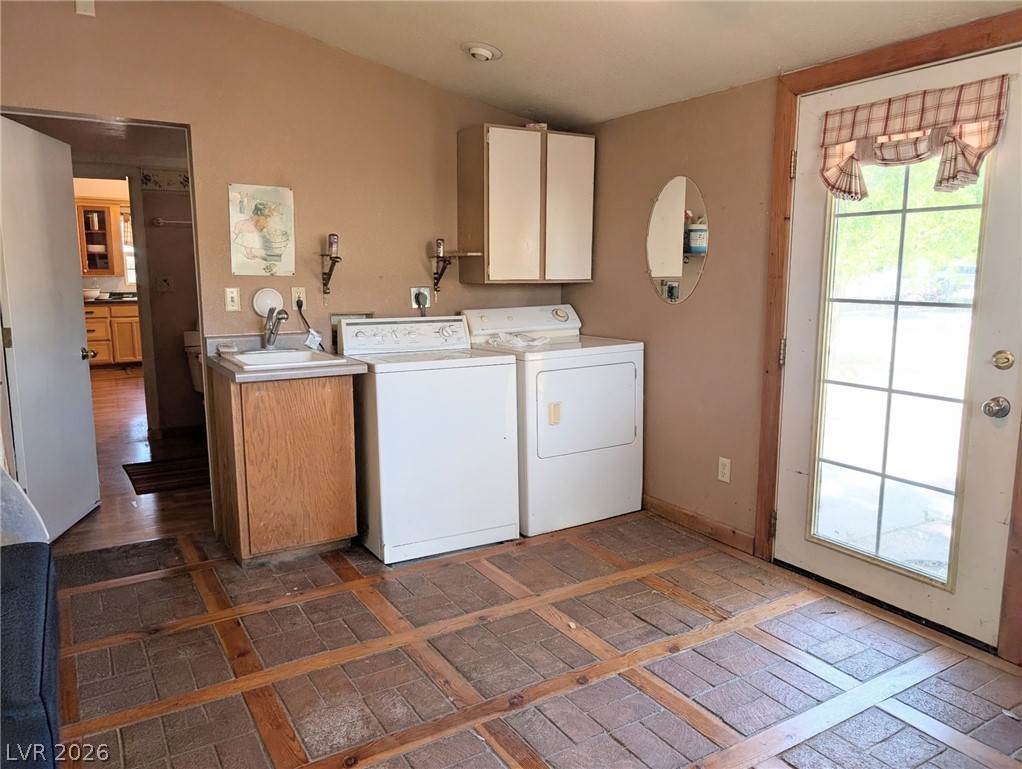 997 Phillips Street Panaca, NV 89042 - Photo 16 of 19 A well-equipped utility room provides practical functionality for daily tasks.