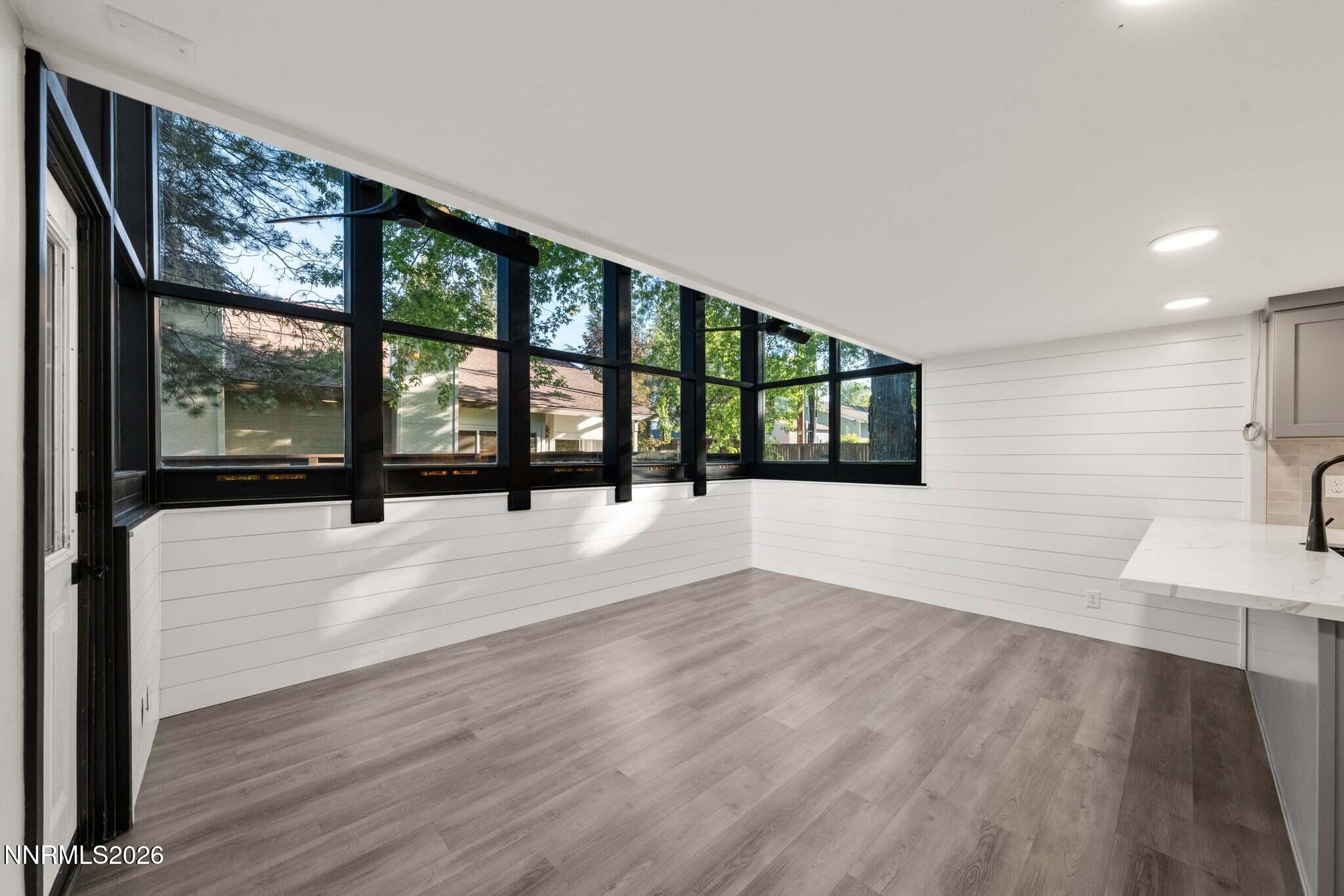 430 Angela Place Reno, NV 89509 - Photo 18 of 48 wooden floor in an empty room with a window
