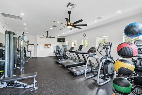 a living room with lots of furniture and a flat screen tv