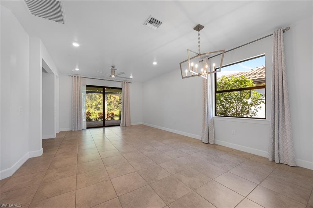 5845 Mayflower Way Ave Maria, FL 34142 - Photo 12 of 48 a view of livingroom with window