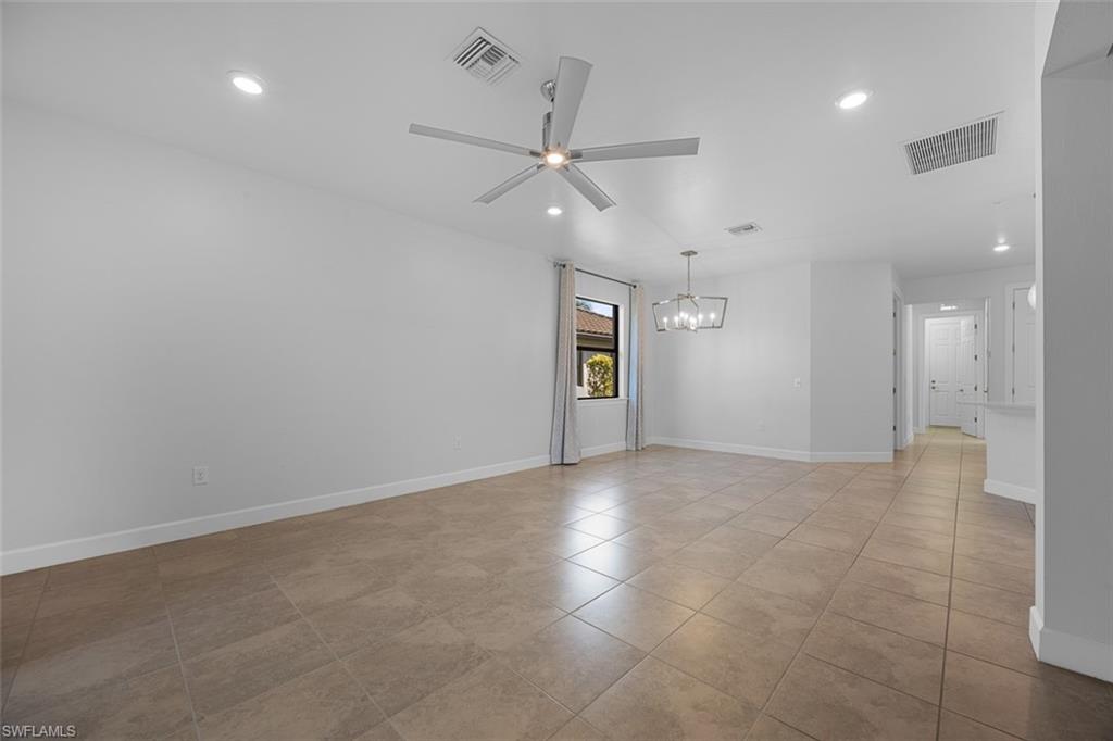 5845 Mayflower Way Ave Maria, FL 34142 - Photo 15 of 48 an empty room with fan and entrance