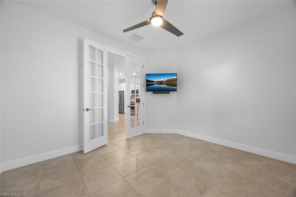 5845 Mayflower Way Ave Maria, FL 34142 - Photo 24 of 48 an empty room with closet and windows