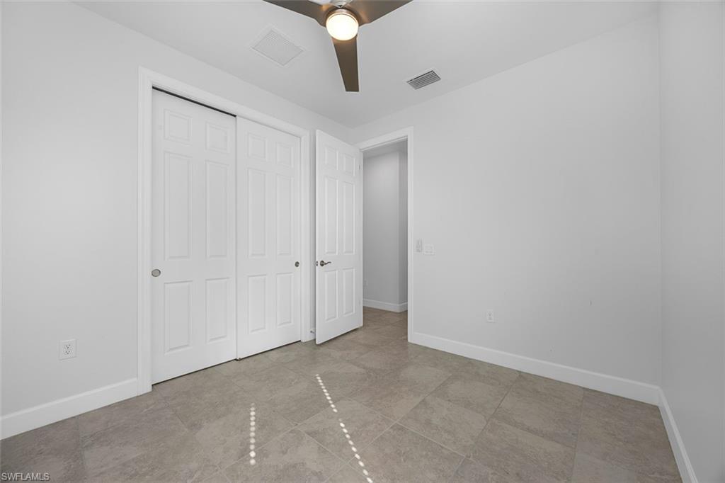 5845 Mayflower Way Ave Maria, FL 34142 - Photo 27 of 48 a view of an empty room
