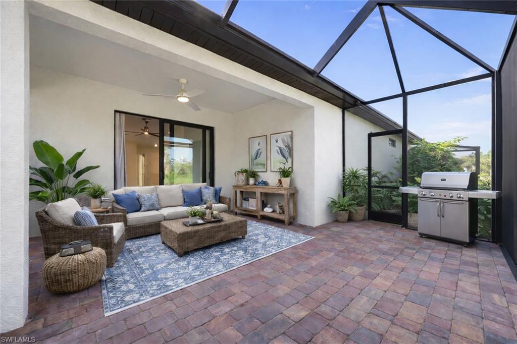 5845 Mayflower Way Ave Maria, FL 34142 - Photo 28 of 48 a living room with furniture