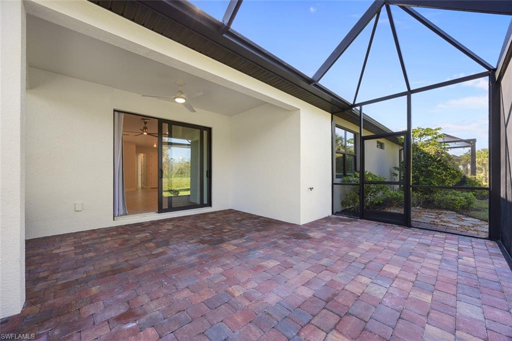 5845 Mayflower Way Ave Maria, FL 34142 - Photo 29 of 48 a view of a room with a trees
