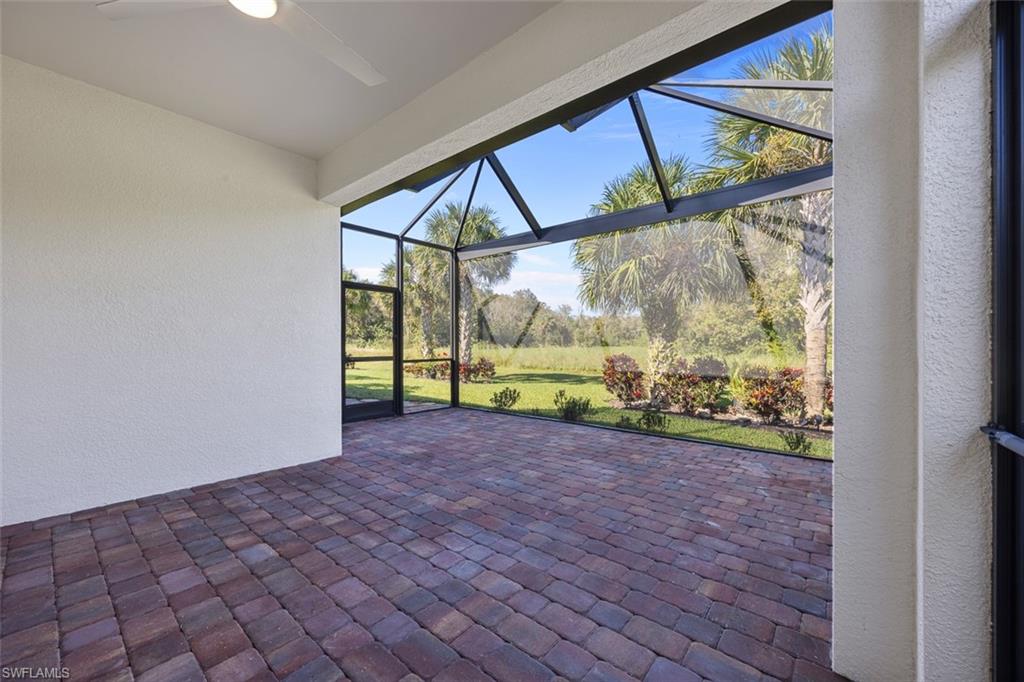 5845 Mayflower Way Ave Maria, FL 34142 - Photo 32 of 48 a view of porch with wooden floor