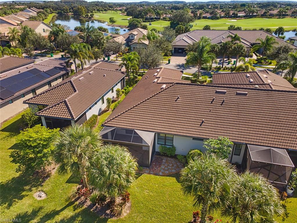 5845 Mayflower Way Ave Maria, FL 34142 - Photo 41 of 48 an aerial view of a house with a garden