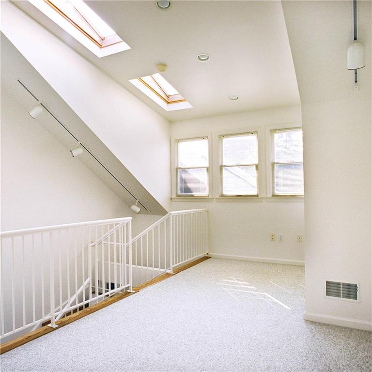 326 Hailman Street Pittsburgh, PA 15206 - Photo 20 of 22 a view of an empty room with a window