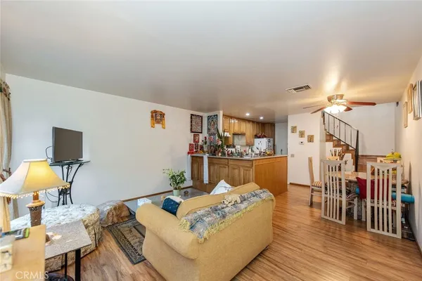 a living room with furniture and a table