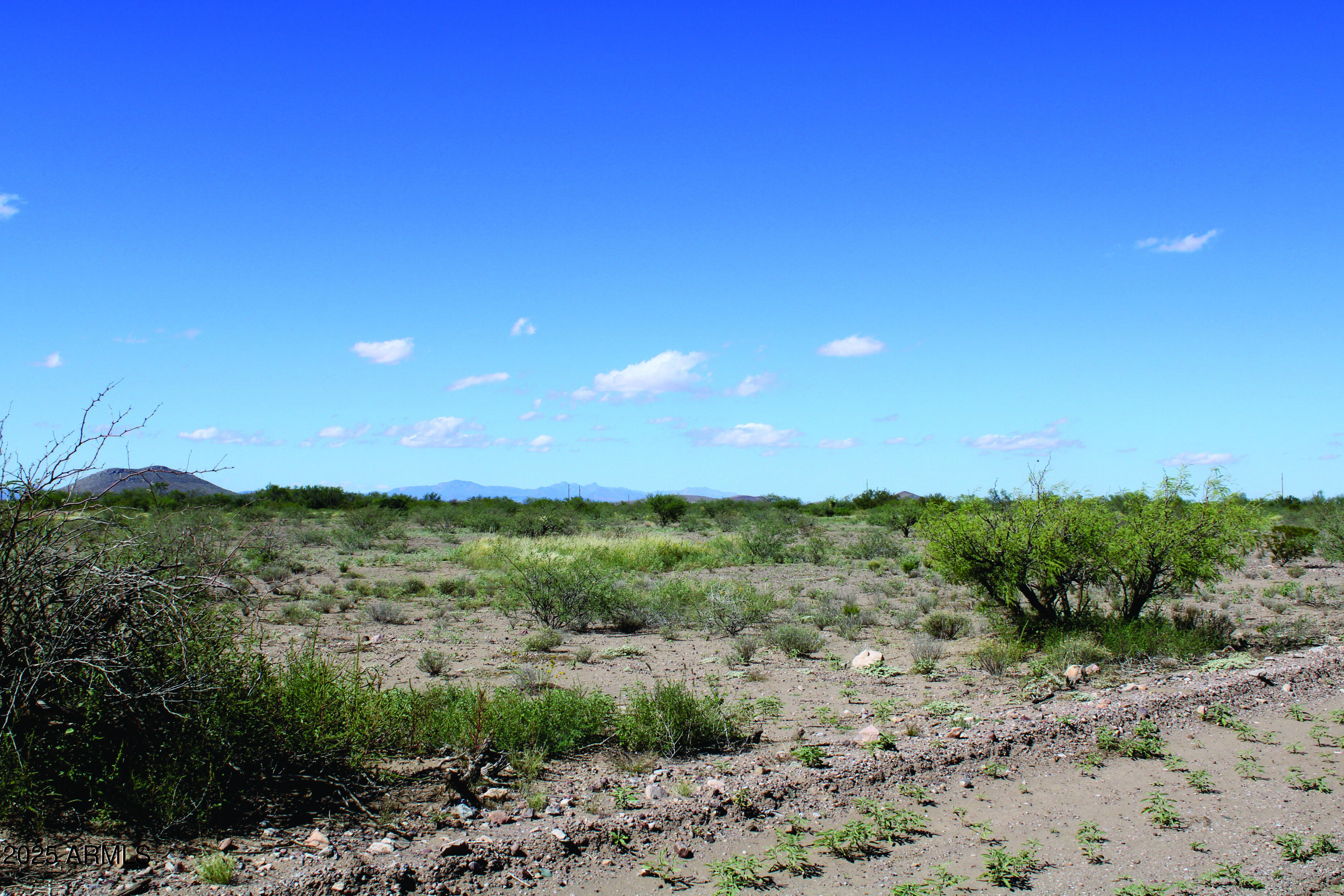 8.59-acres North Leslie Canyon Road, Unit 29A Douglas, AZ 85607 - Photo 11 of 17 a view of a lake with mountains in the background