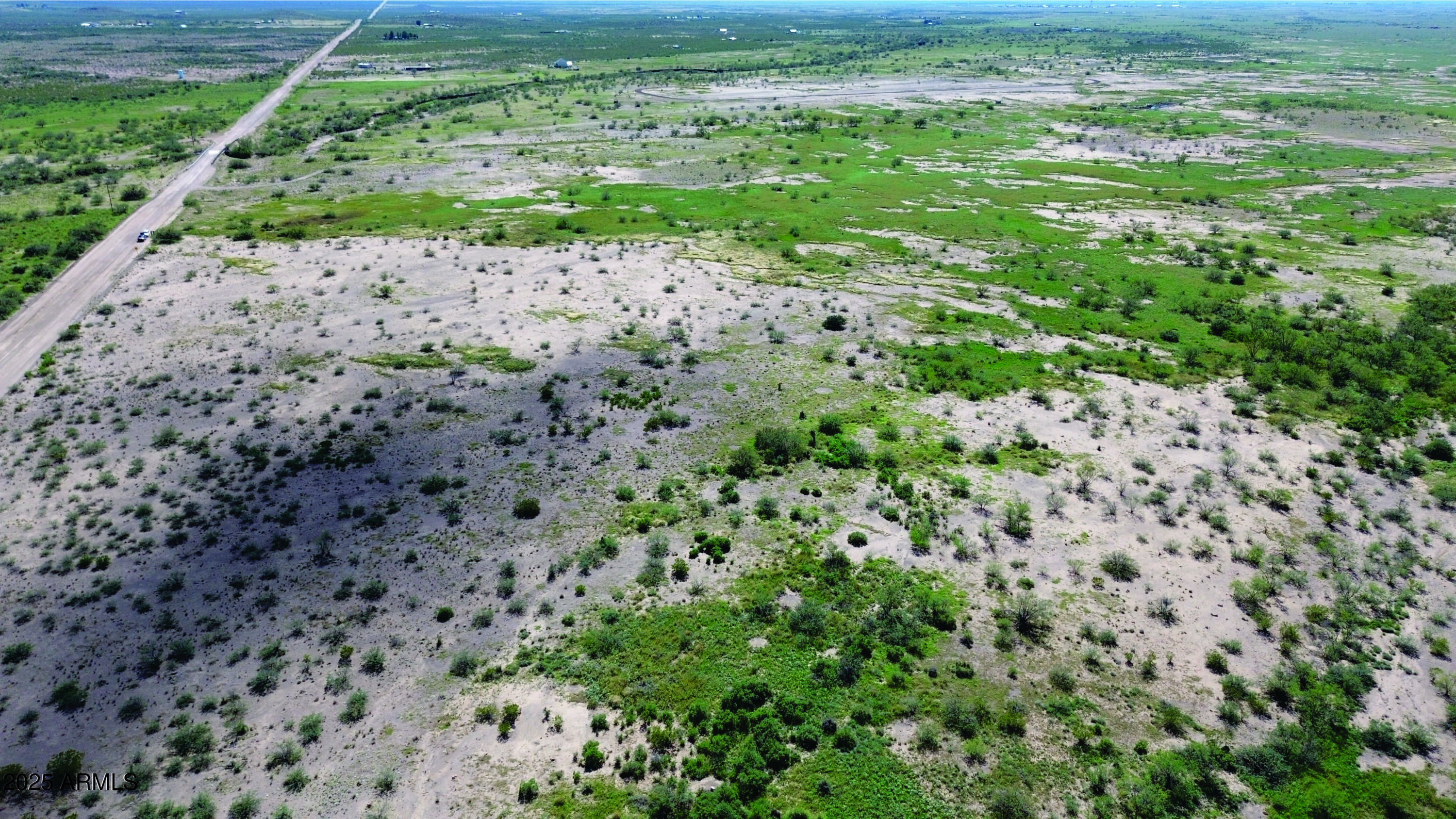 8.59-acres North Leslie Canyon Road, Unit 29A Douglas, AZ 85607 - Photo 3 of 17 a view of a yard with a wooden fence
