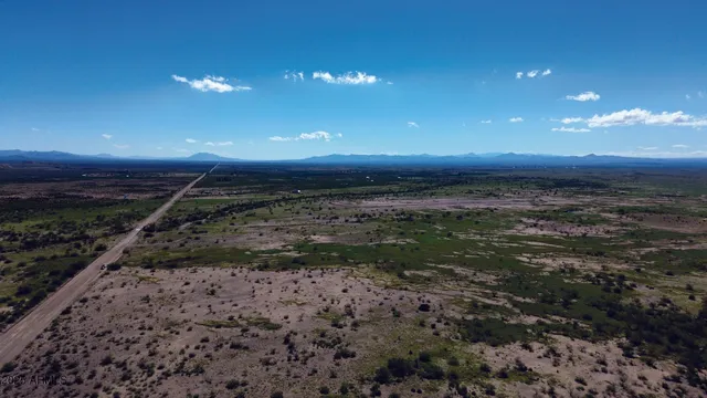 a view of a backyard of a house