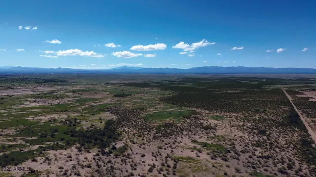 a view of a house with a mountain