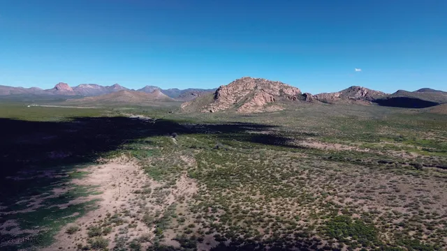 a view of a road with a yard