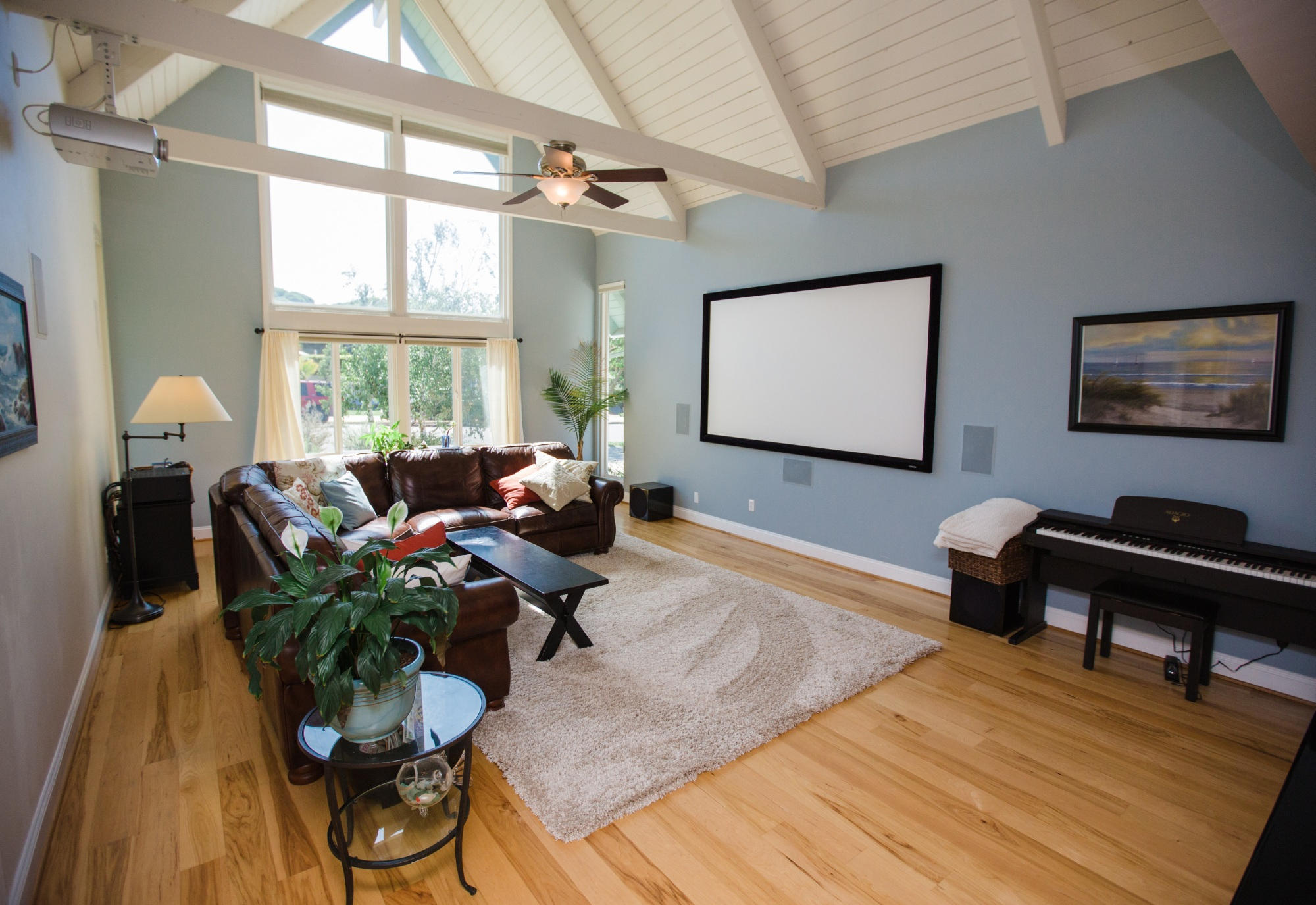 927 Randolph Road Santa Barbara, CA 93111 - Photo 6 of 17 a living room with furniture two window and a flat screen tv