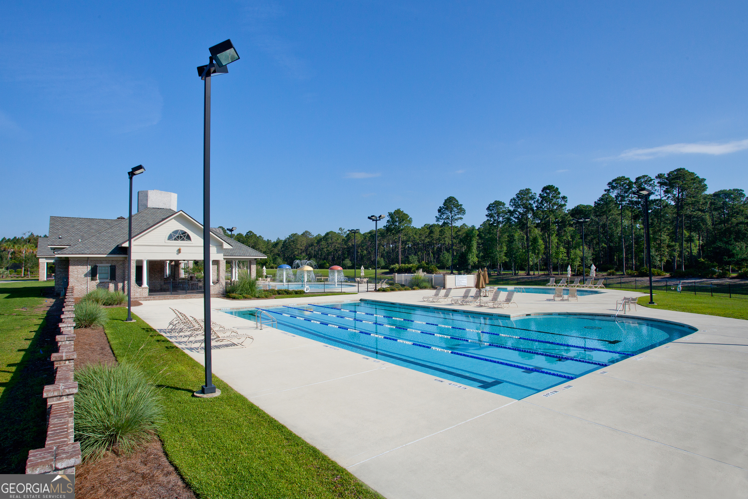 100 Amberjack Loop St. Marys, GA 31558 - Photo 9 of 16 a view of a house with swimming pool