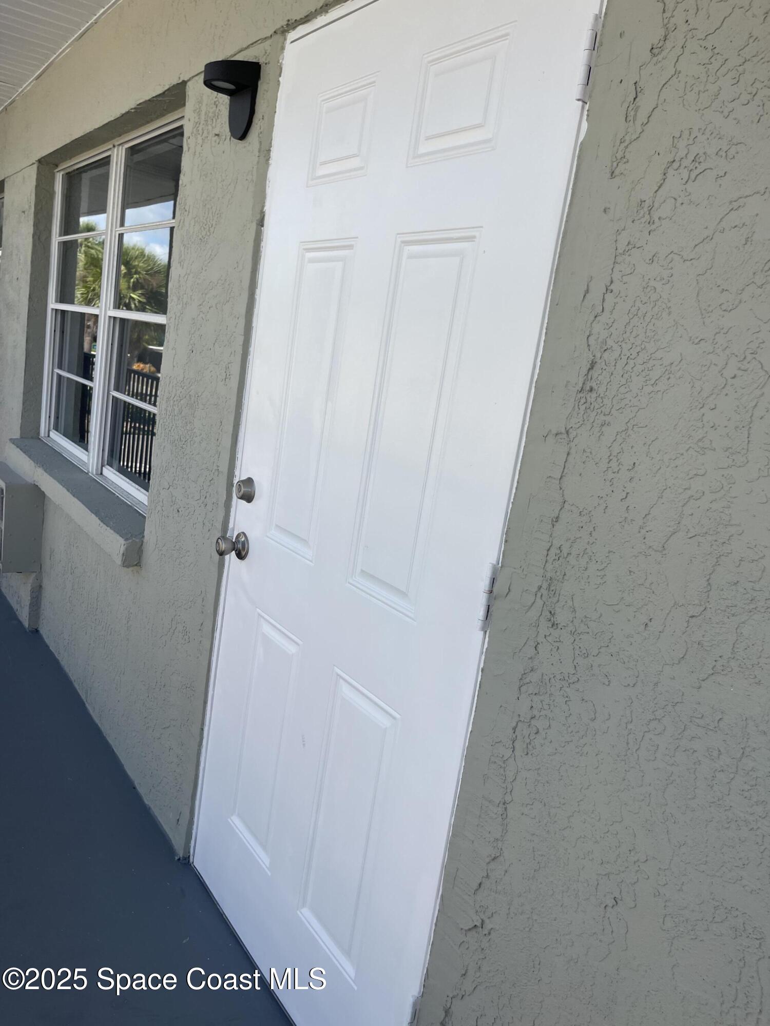 6100 Ridgewood Avenue, Unit 7 Cocoa Beach, FL 32931 - Photo 10 of 15 IMG_8667