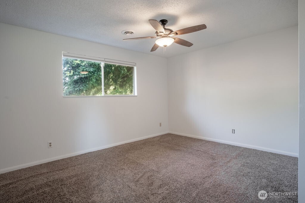 651 Jorgensen Road Onalaska, WA 98570 - Photo 12 of 36 an empty room with a window