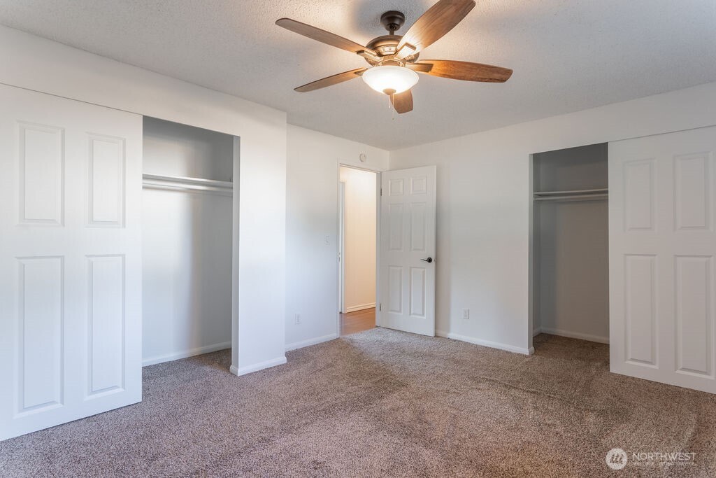 651 Jorgensen Road Onalaska, WA 98570 - Photo 13 of 36 a view of an empty room with a ceiling fan