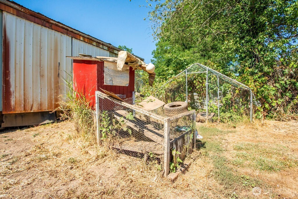 651 Jorgensen Road Onalaska, WA 98570 - Photo 23 of 36 a house that has a tree in front of it