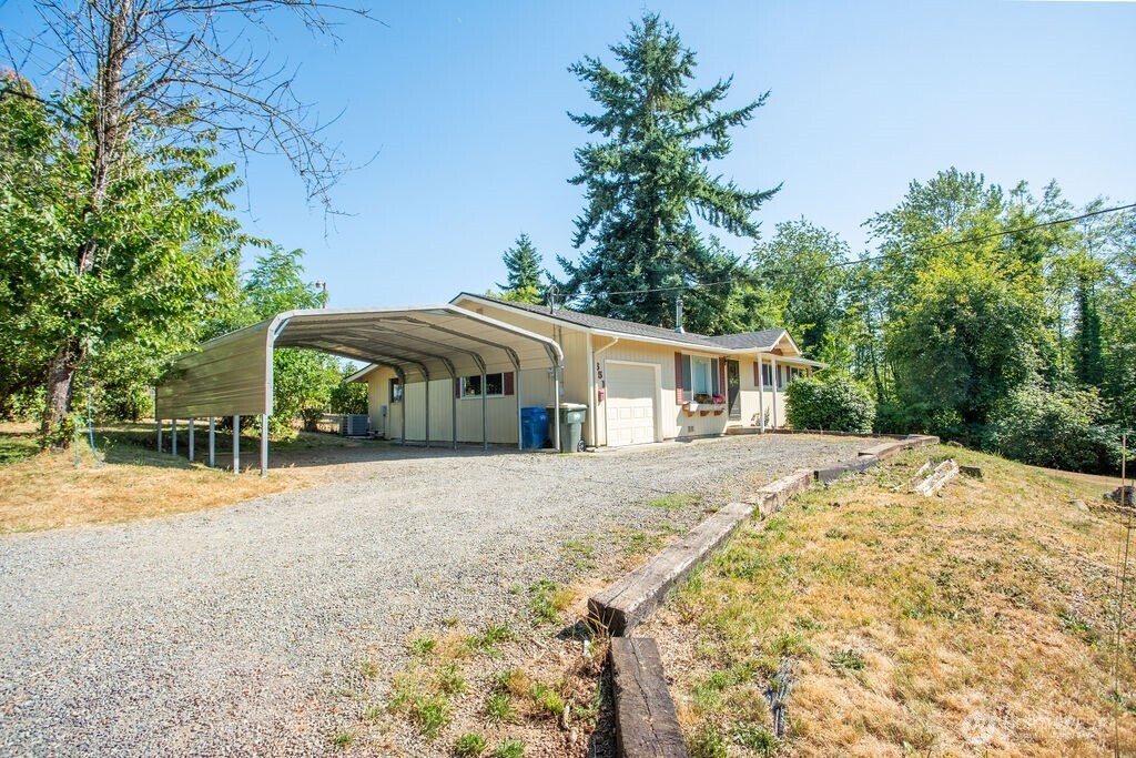 651 Jorgensen Road Onalaska, WA 98570 - Photo 26 of 36 a front view of a house with a garden