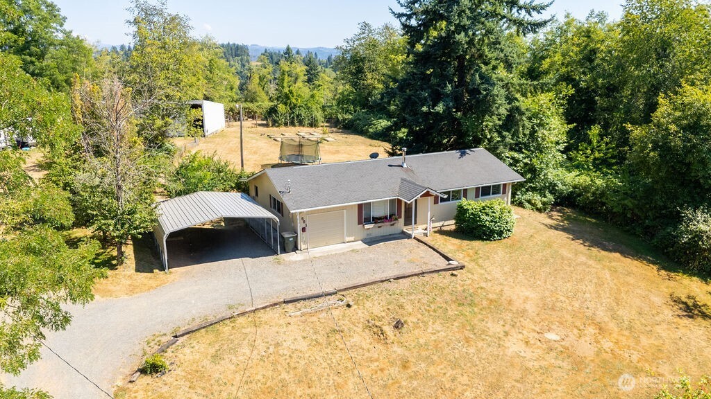 651 Jorgensen Road Onalaska, WA 98570 - Photo 31 of 36 view of a house with a yard