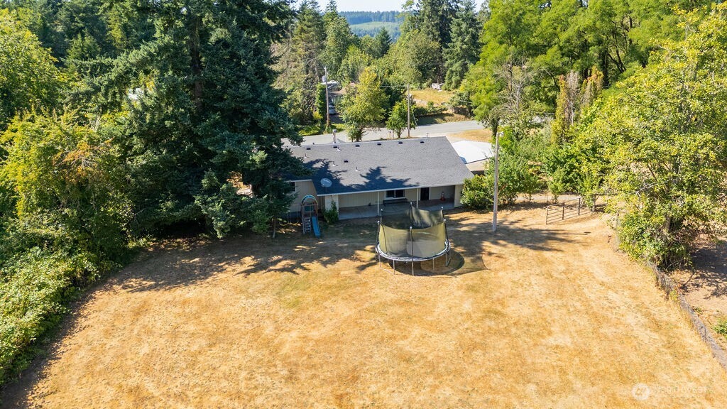 651 Jorgensen Road Onalaska, WA 98570 - Photo 35 of 36 a view of a house with a yard