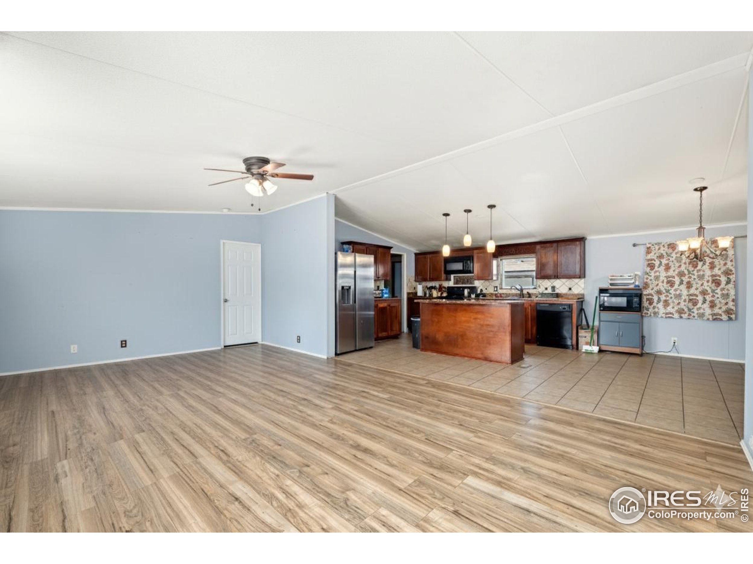218 Grape Street, Unit 29 Hudson, CO 80642 - Photo 21 of 26 a view of a kitchen with a sink