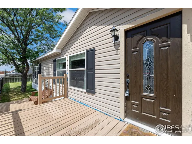 a front view of a house with a porch