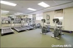 a gym room with gym equipment
