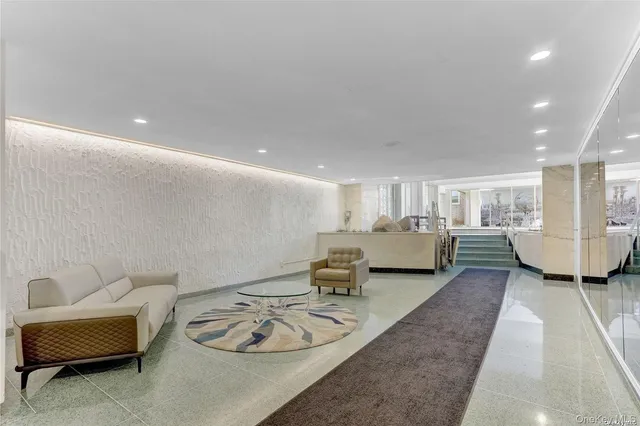 a living room with furniture and a table