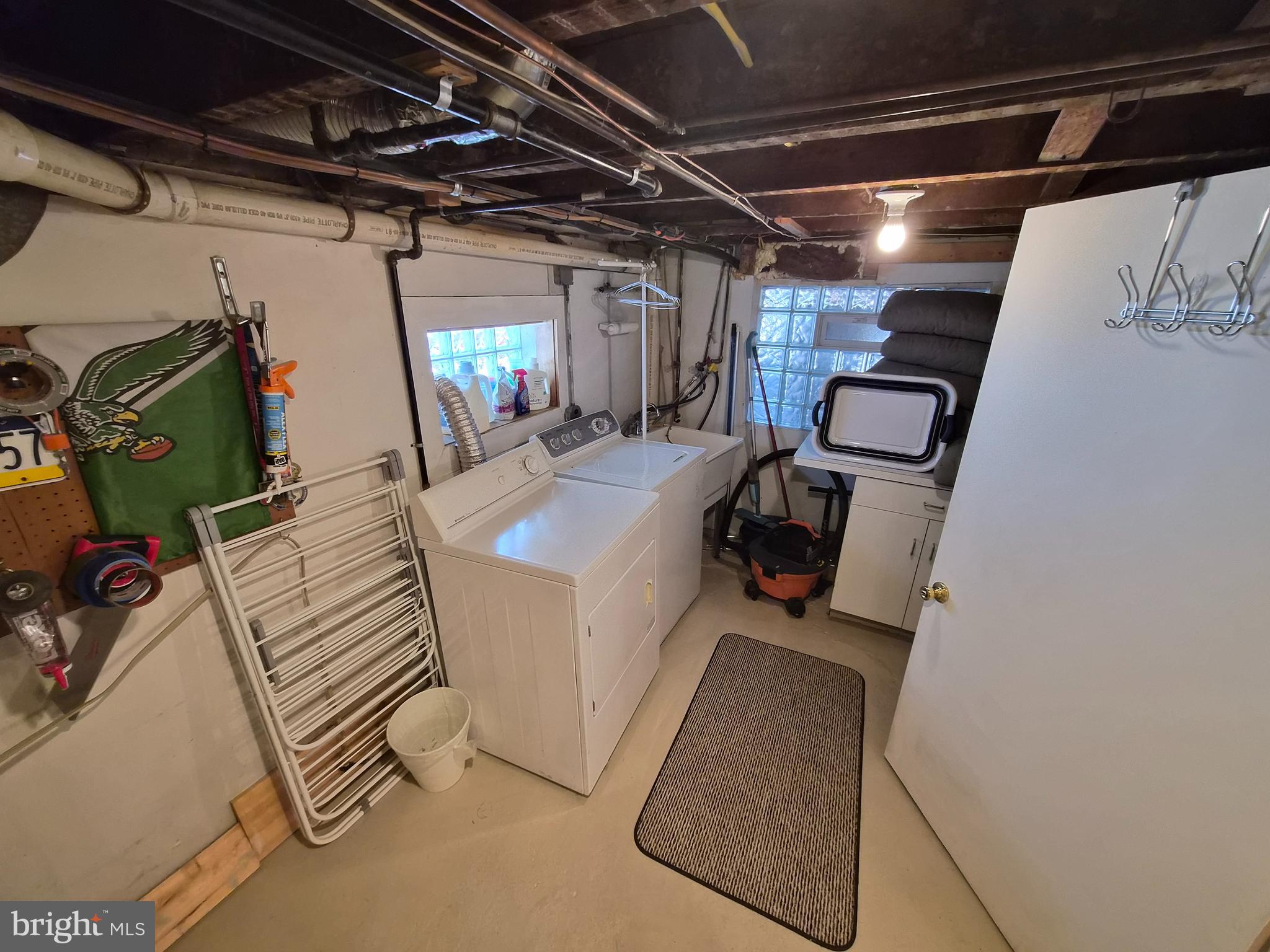 1601 Belt Street Baltimore, MD 21230 - Photo 21 of 30 a utility room with dryer washer and stair
