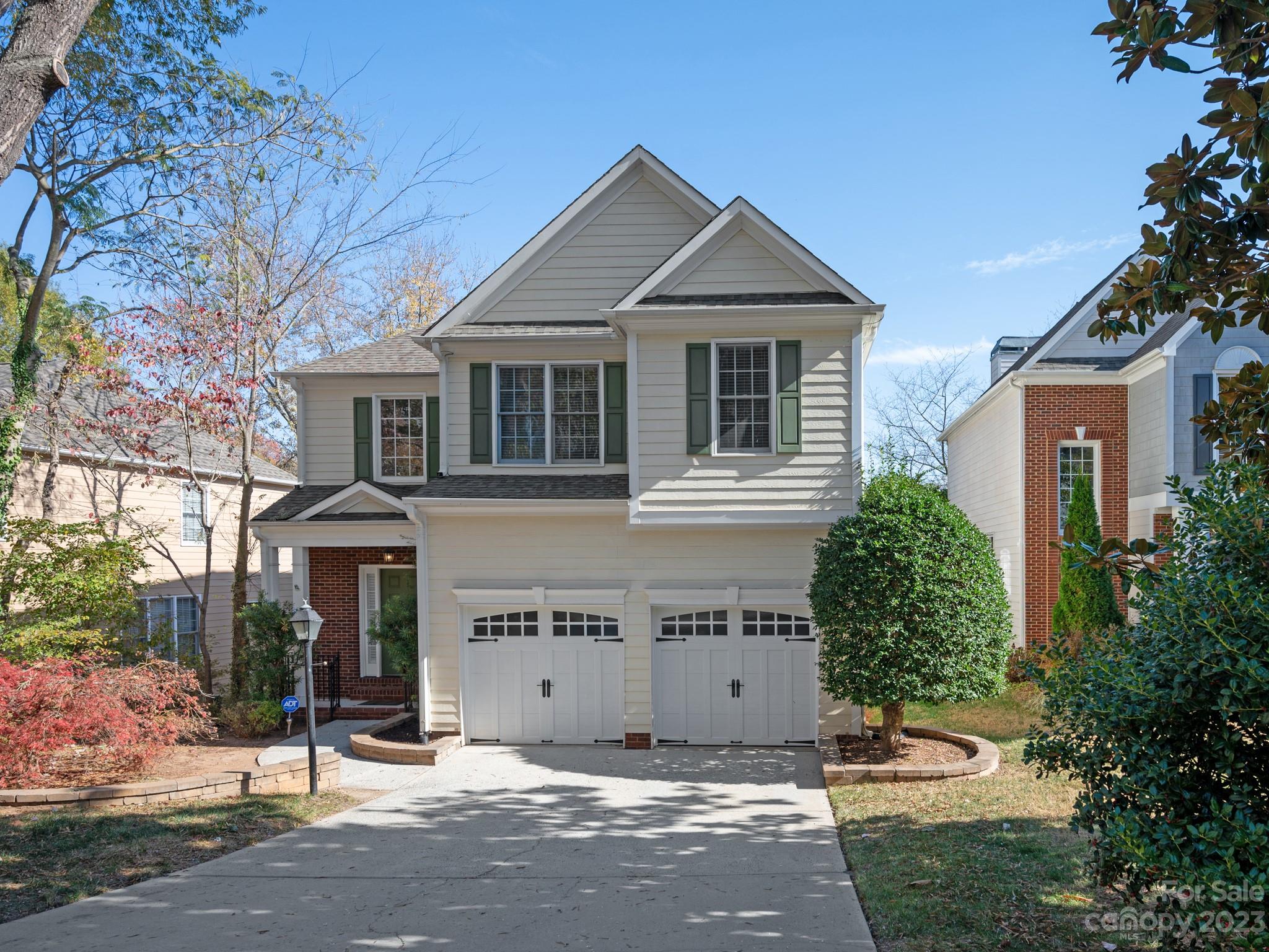 1934 Dunhill Drive Charlotte, NC 28205 - Photo 1 of 31 a front view of a house with a yard