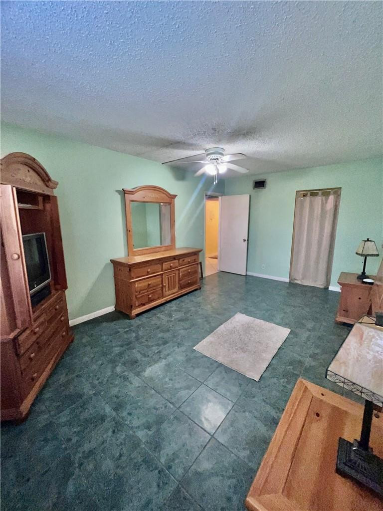 Undisclosed Address Margate, FL 33063 - Photo 11 of 15 a living room with furniture and a flat screen tv