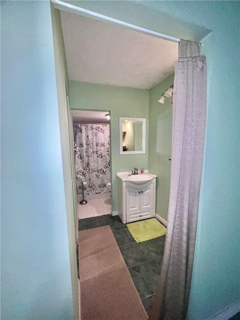Undisclosed Address Margate, FL 33063 - Photo 5 of 15 a bathroom with a sink toilet and shower