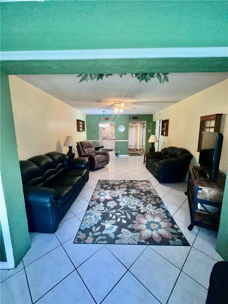 Undisclosed Address Margate, FL 33063 - Photo 9 of 15 a living room with furniture