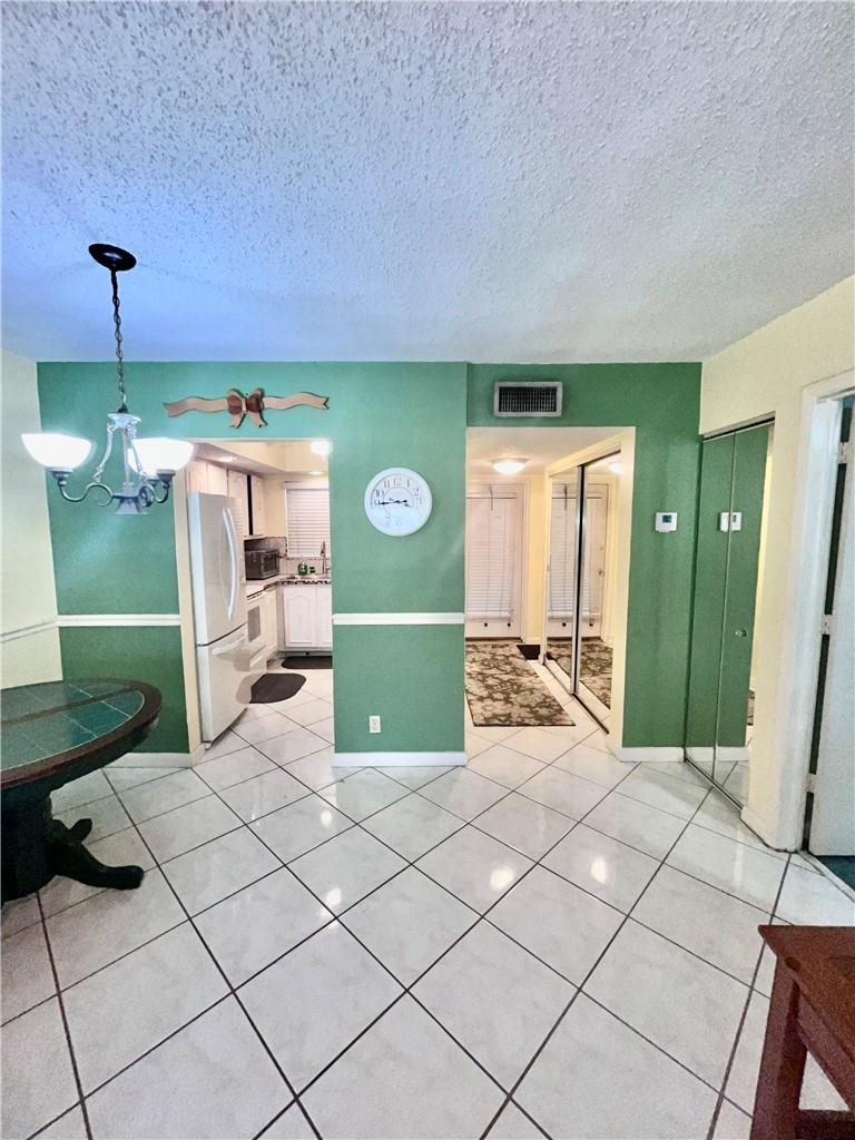 Undisclosed Address Margate, FL 33063 - Photo 10 of 15 a view of a livingroom with furniture and window