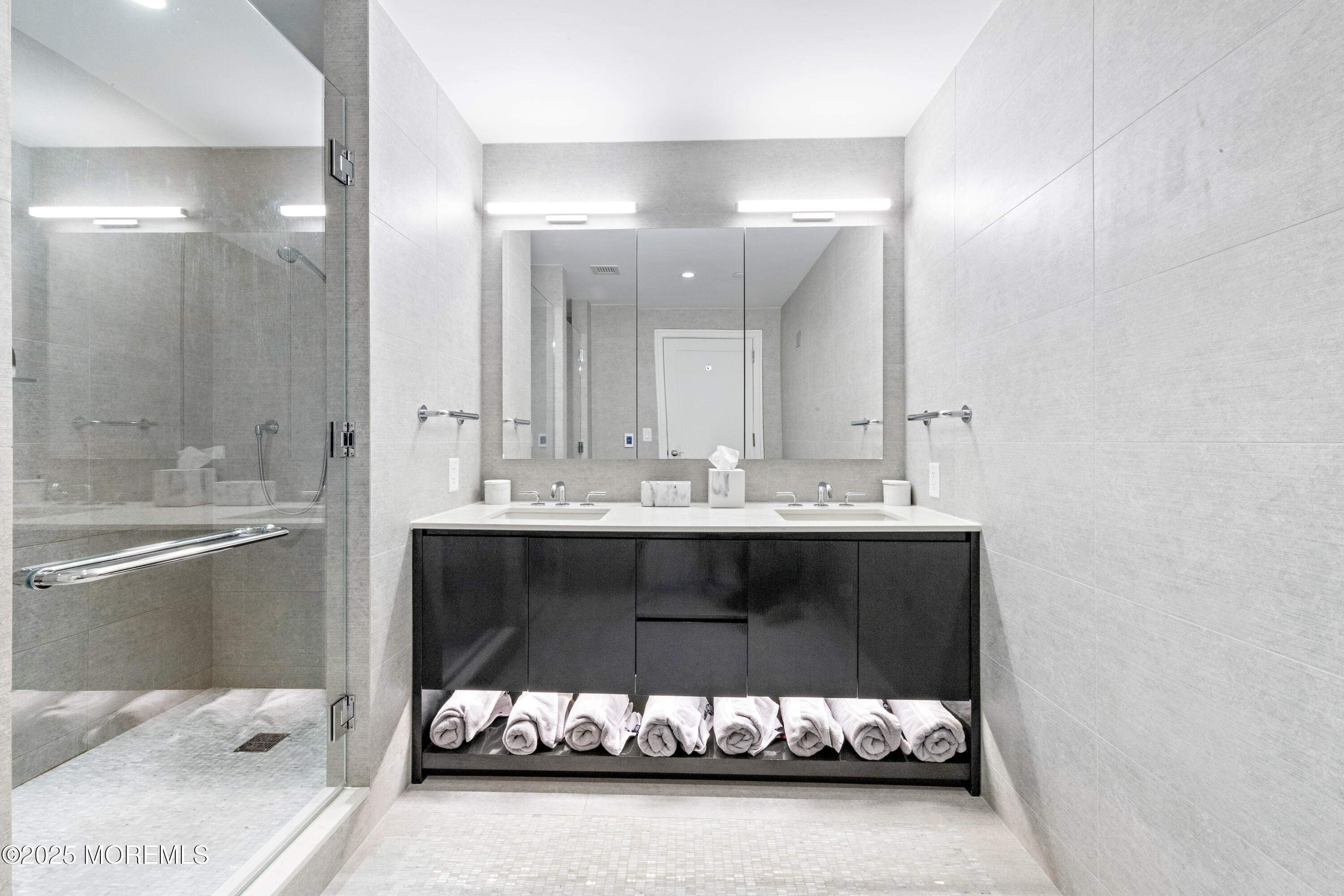 15 Morris Avenue, Unit 202 Long Branch, NJ 07740 - Photo 20 of 43 a bathroom with a double vanity sink and mirror