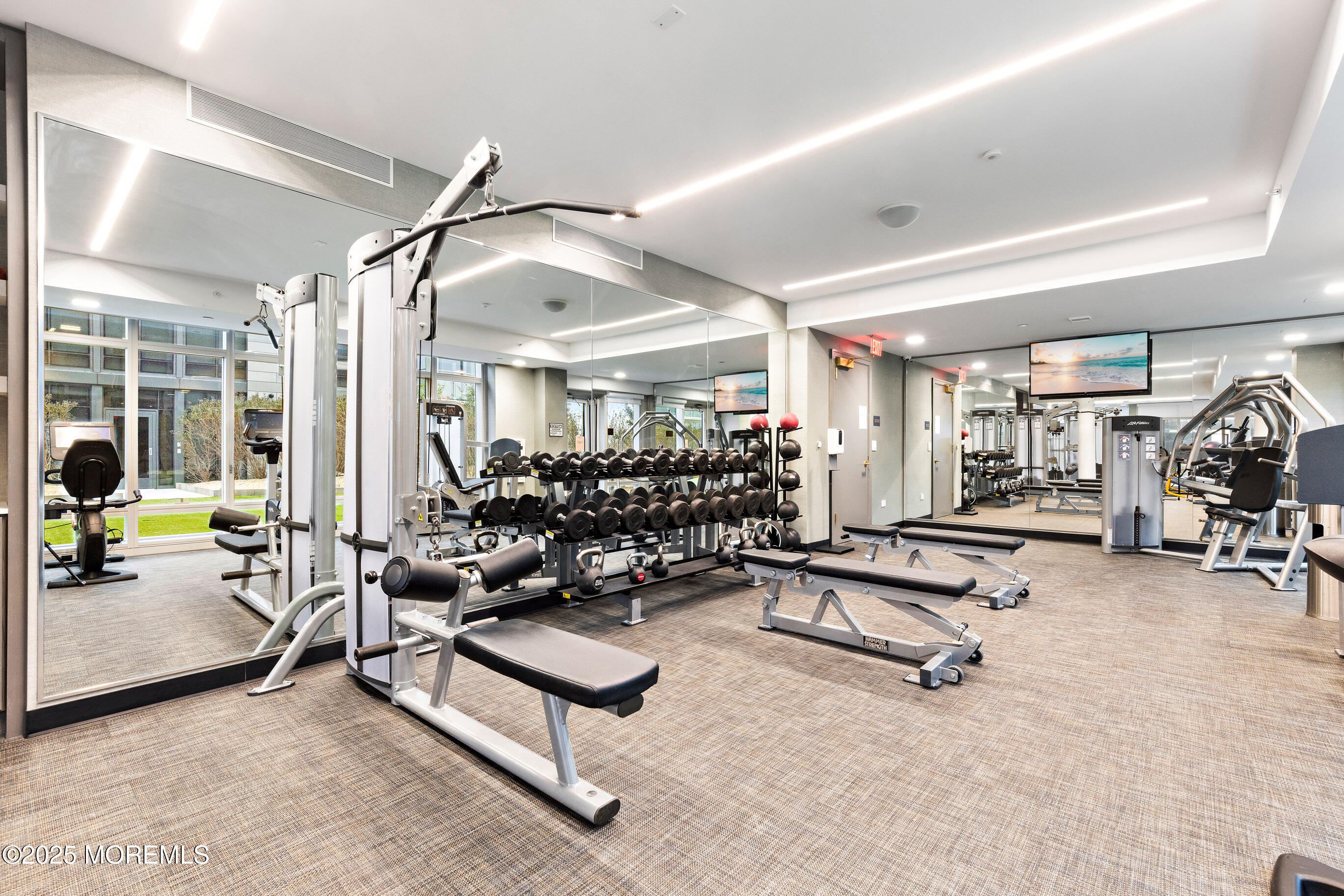 15 Morris Avenue, Unit 202 Long Branch, NJ 07740 - Photo 27 of 43 a view of a room with gym equipment
