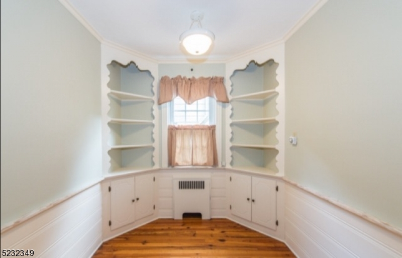 17 Bailey Road Millburn, NJ 07041 - Photo 11 of 24 a bedroom with a bed and a window