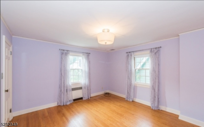 17 Bailey Road Millburn, NJ 07041 - Photo 15 of 24 a view of empty room with window