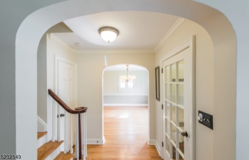 17 Bailey Road Millburn, NJ 07041 - Photo 2 of 24 a view of staircase with white walls