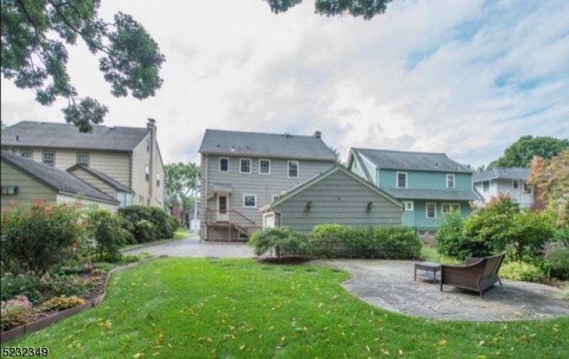 17 Bailey Road Millburn, NJ 07041 - Photo 23 of 24 a front view of house with yard and green space