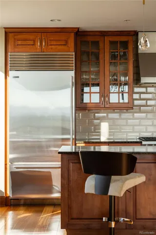 a view of kitchen with granite countertop window and table