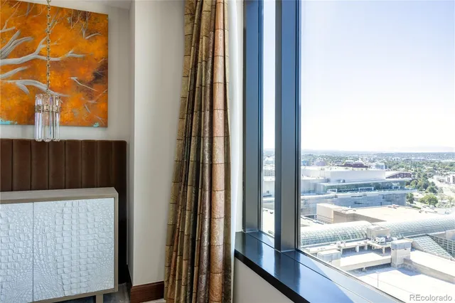 a view of a glass door and a window