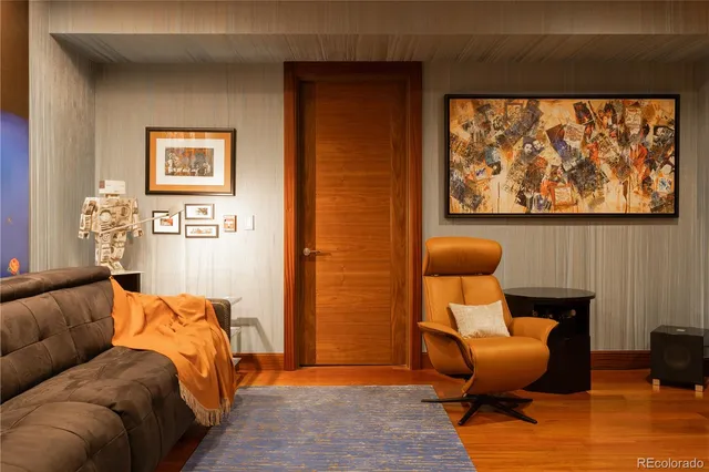 a bedroom with furniture and a chair